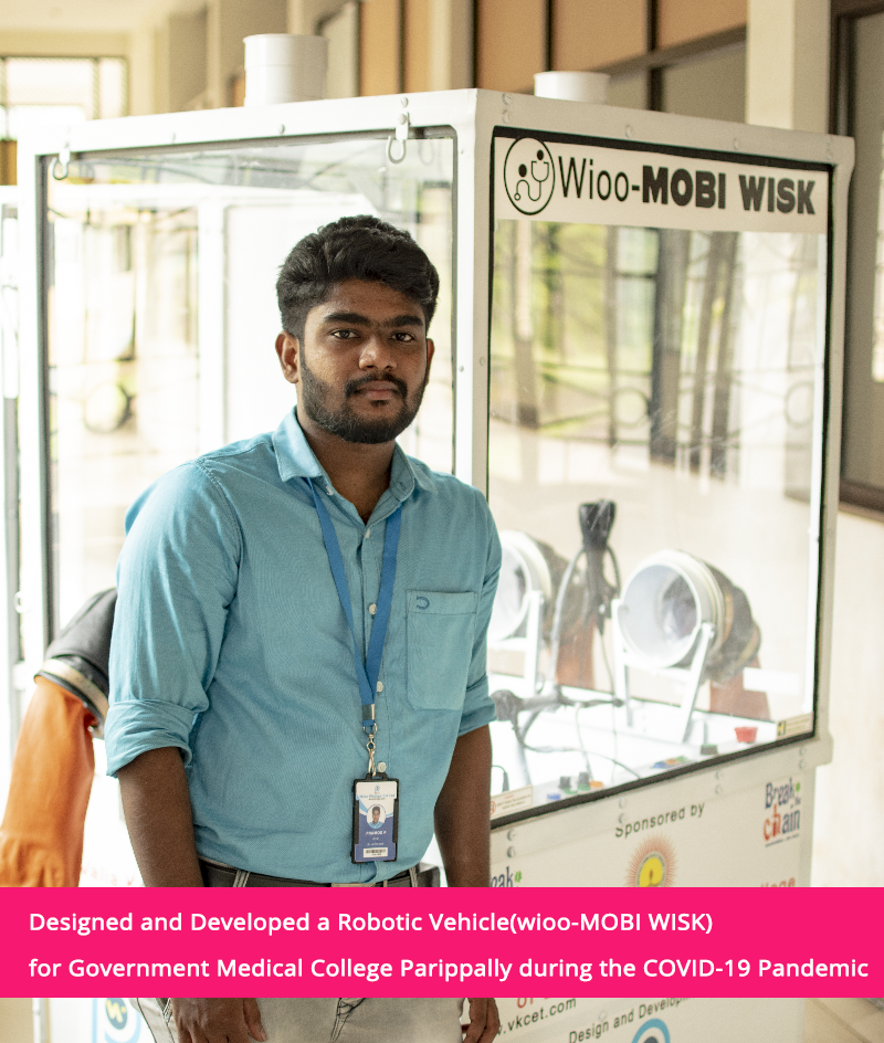 Pramod Prasad beside the Wioo-MOBI WISK robotic vehicle